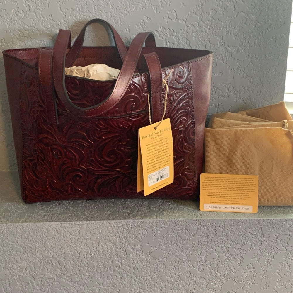 NWT Patricia Nash Varsi tooled leather Tote/Shoulder bag. Color: Oxblood